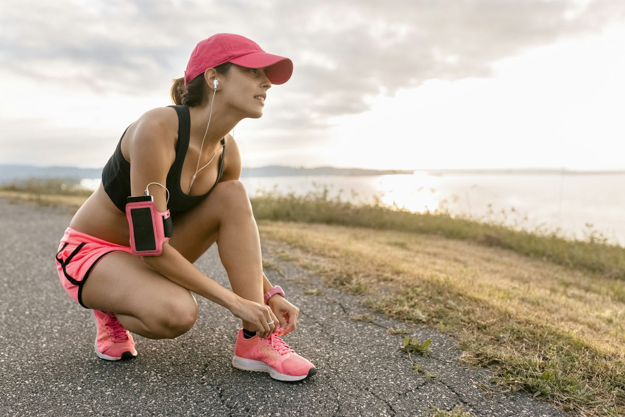 Young woman warming up for training